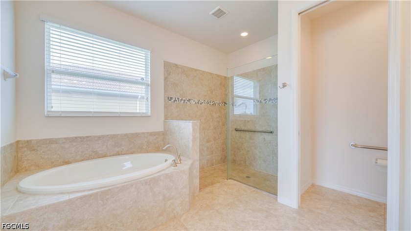 !!Just Reduced!! Located on a premium corner lake lot in the - photo 22