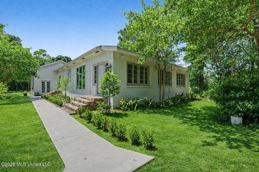 Tucked away on 4.5 acres this private estate blends timeless - photo 2
