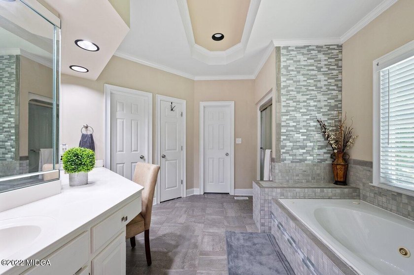 Gorgeous custom built 1 level hard coat stucco home located on - photo 16