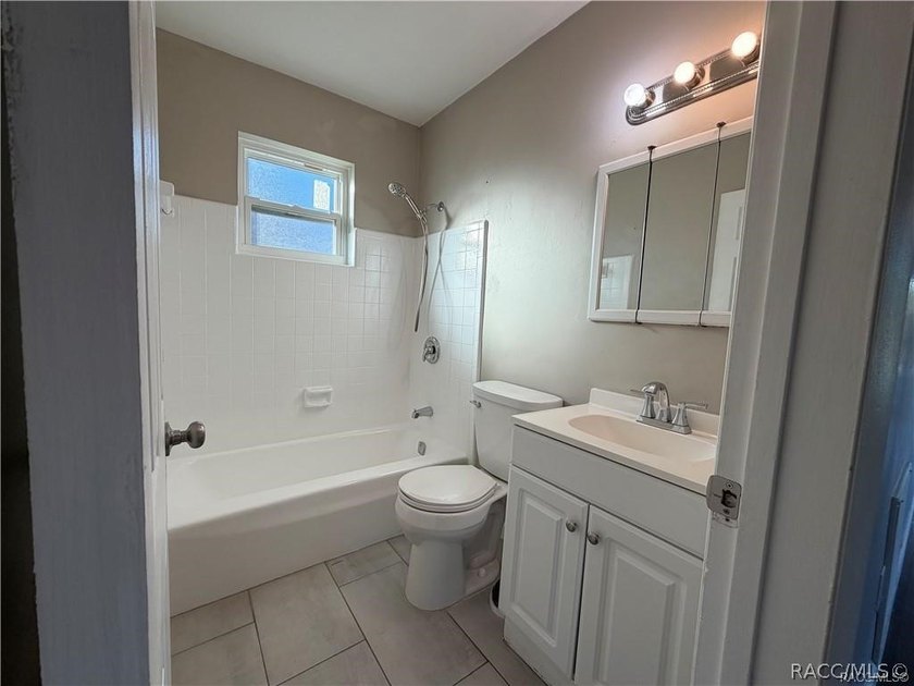 Cute as a button and move-in ready! This charming home is the - photo 16
