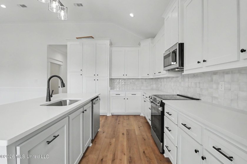 Welcome to this stunning new construction waterfront home! This - photo 7