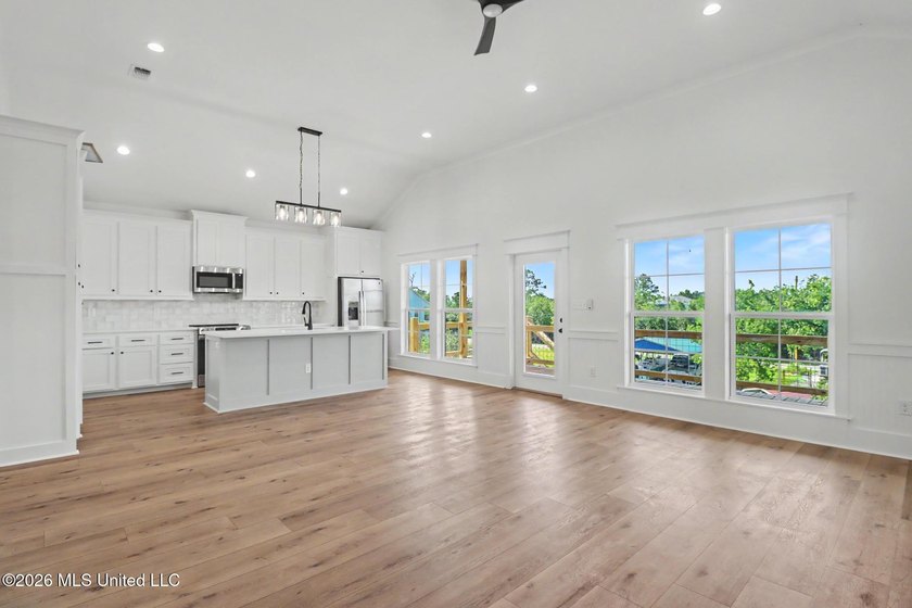 Welcome to this stunning new construction waterfront home! This - photo 8