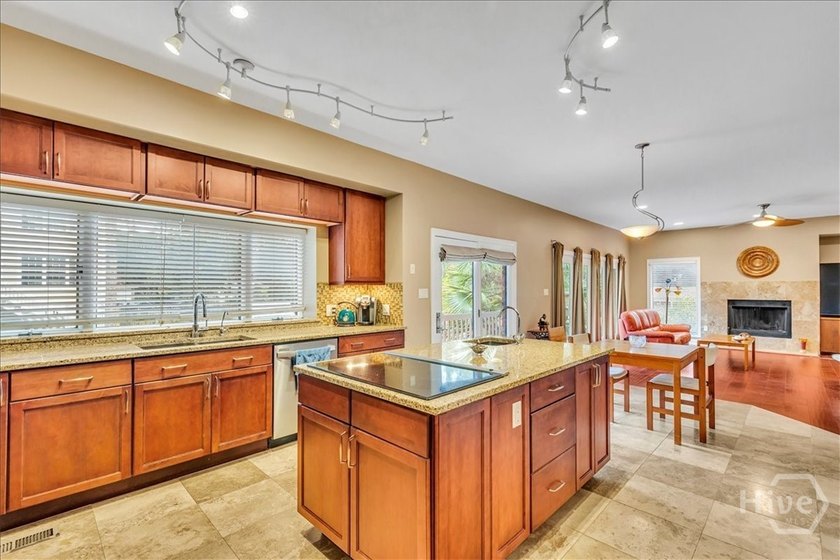 This inviting 5-bedroom, 3-bath all-brick home sits on just - photo 11