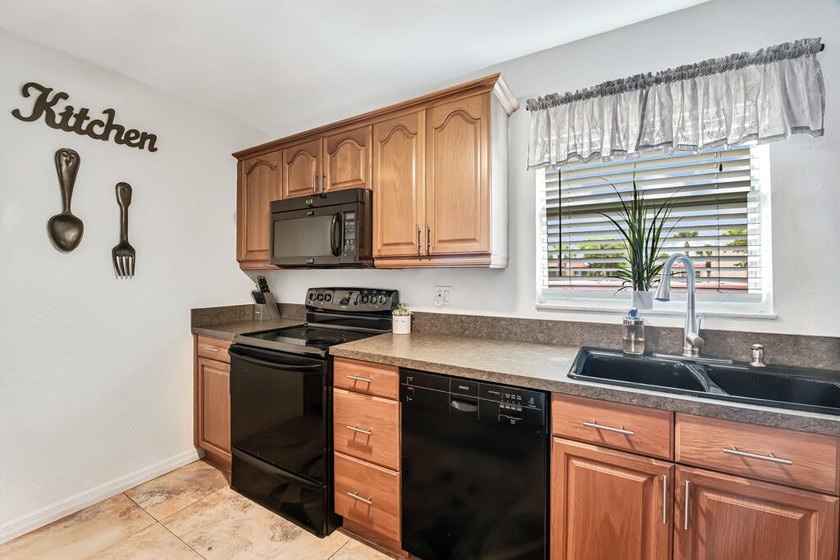 Introducing this beautifully maintained 2-bedroom condo with - photo 8