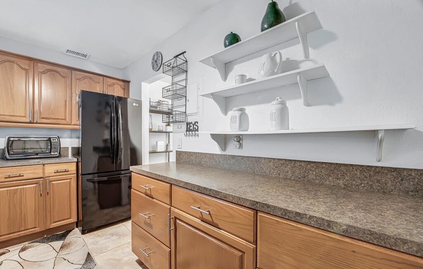 Introducing this beautifully maintained 2-bedroom condo with - photo 10