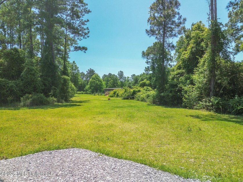 Nestled in rural Harrison County, this beautiful 4.2-acre - photo 3