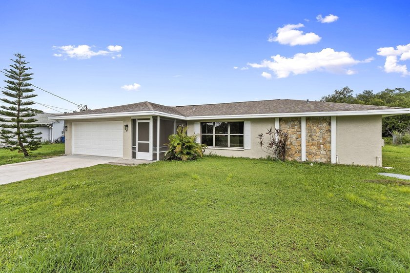 This beautifully remodeled pool home on an over sized lot is - photo 3
