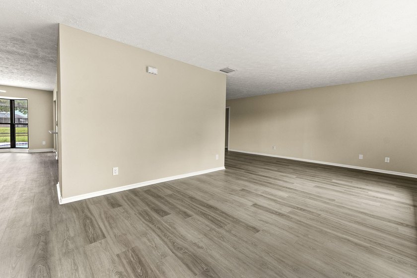 This beautifully remodeled pool home on an over sized lot is - photo 6