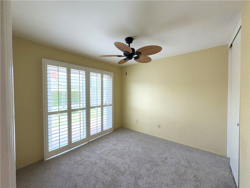 Just one mile from the beach, this immaculate and move-in ready - photo 14