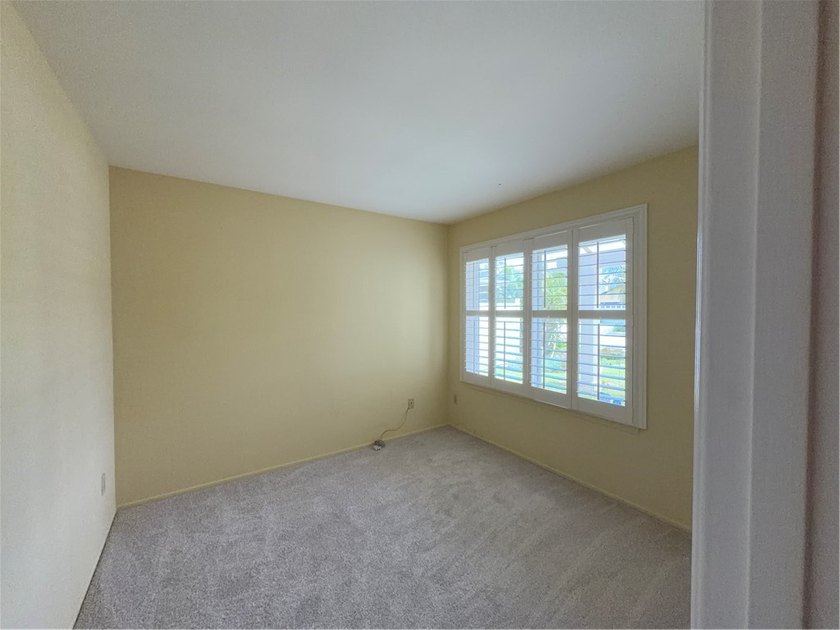 Just one mile from the beach, this immaculate and move-in ready - photo 18