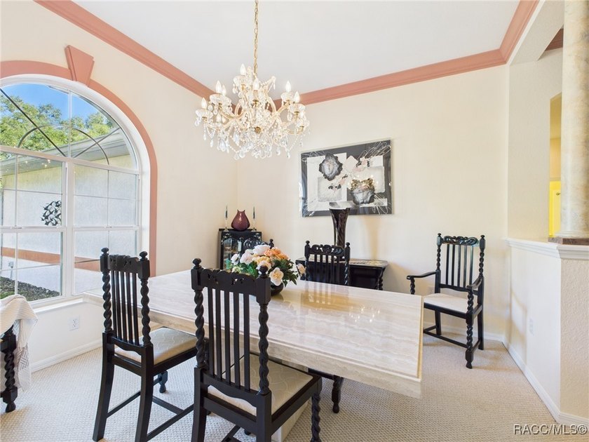Beautiful Pool Home in Rainbow Springs Country Club Nestled in - photo 4