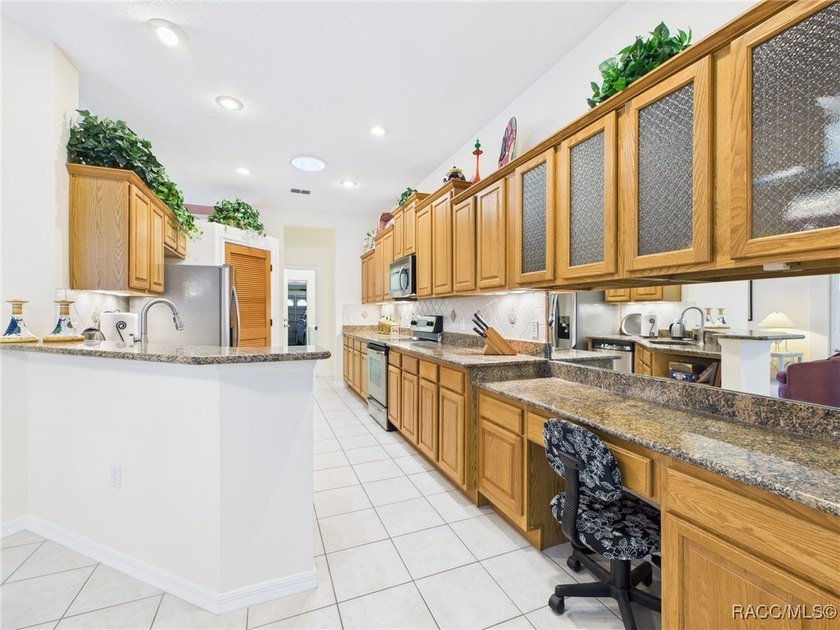 Beautiful Pool Home in Rainbow Springs Country Club Nestled in - photo 9
