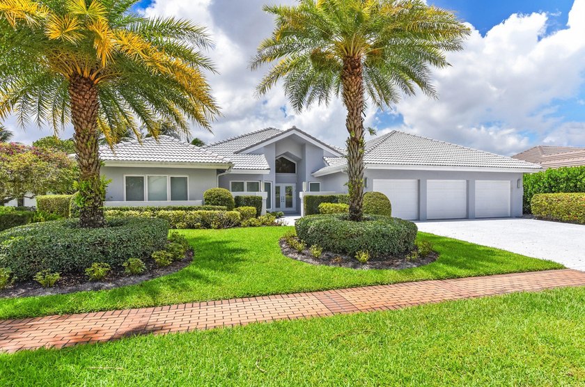 This exceptional and fully renovated one-story 5-bedroom, 5-bath - photo 2