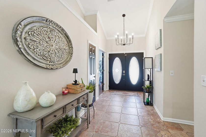 Step into a beautifully maintained home featuring soaring - photo 3