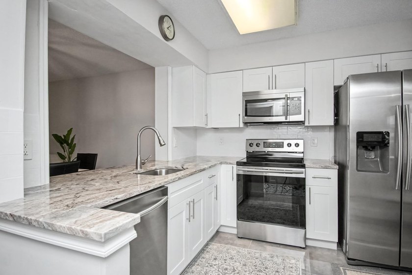 Renovated with timeless style, this beautifully appointed 2 - photo 3
