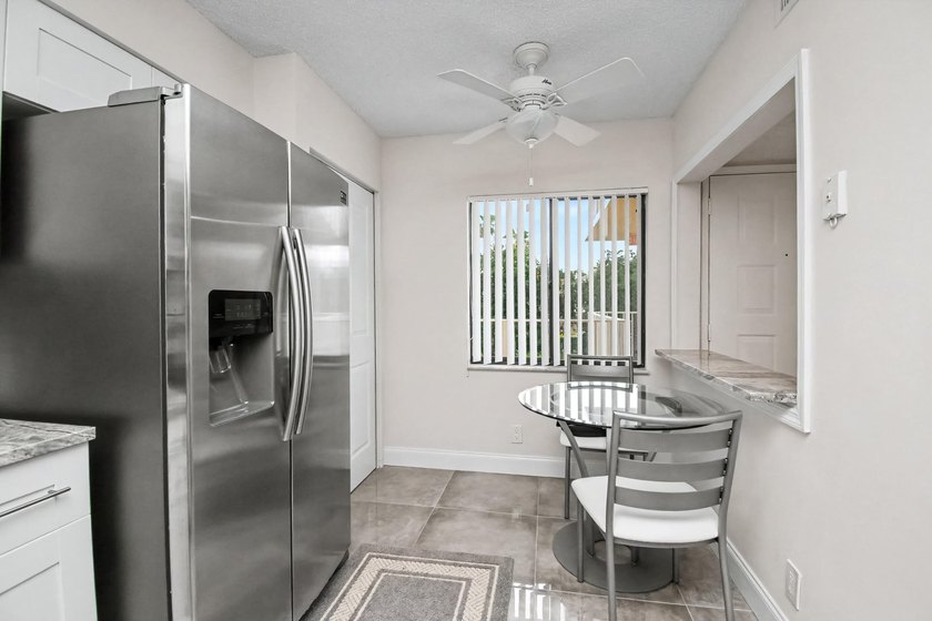 Renovated with timeless style, this beautifully appointed 2 - photo 5