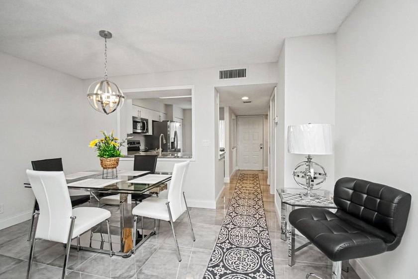 Renovated with timeless style, this beautifully appointed 2 - photo 8