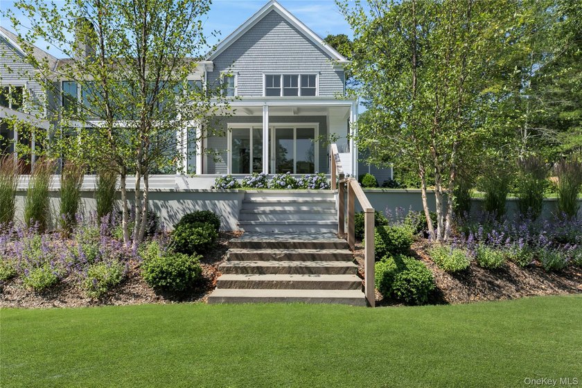 Positioned on a prime stretch of waterfront in Quogue, this - photo 37