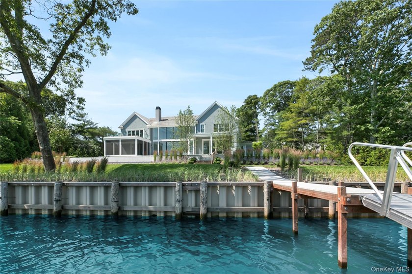 Positioned on a prime stretch of waterfront in Quogue, this - photo 38