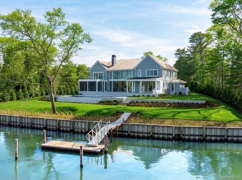 Positioned on a prime stretch of waterfront in Quogue, this - photo 46