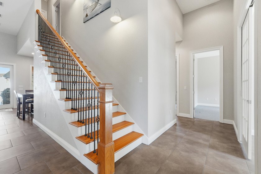 Custom-built home with flexible living space, oversized 3-car - photo 50