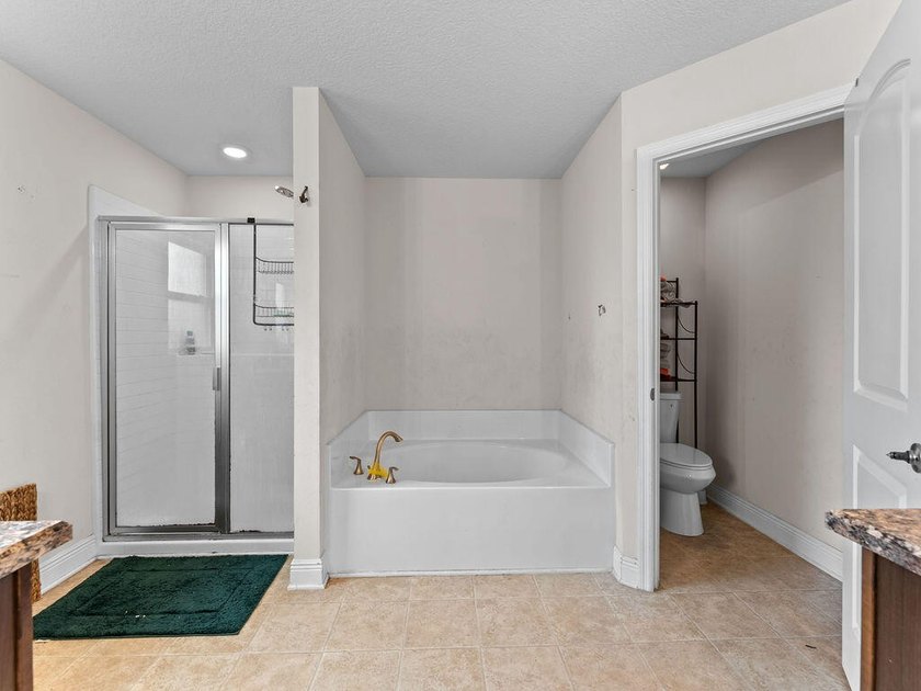 Welcome to this stunning and meticulously maintained 4-bedrm + - photo 11