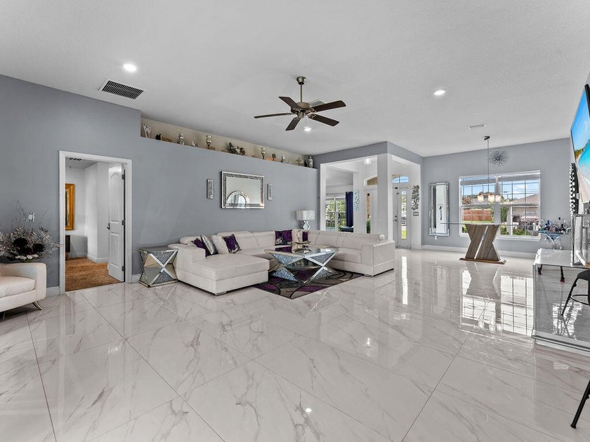 Welcome to this stunning and meticulously maintained 4-bedrm + - photo 12