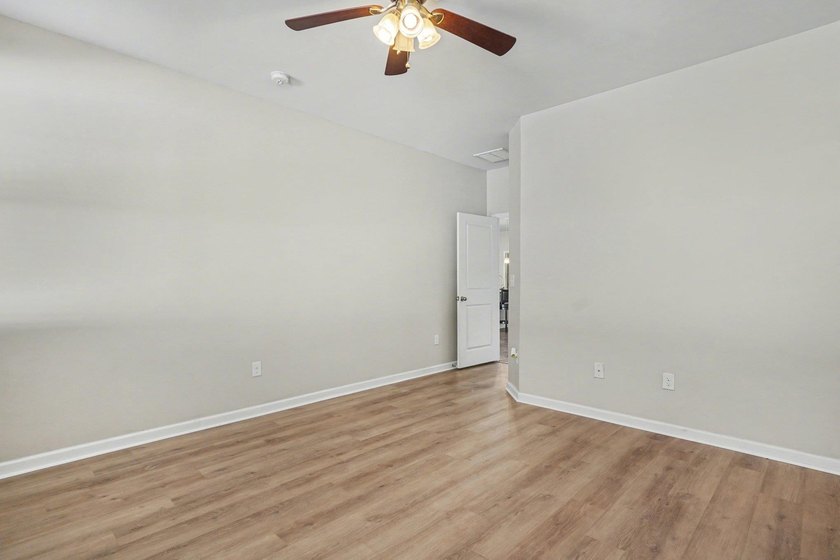 This well-designed three-bedroom, two-bathroom home features an - photo 14