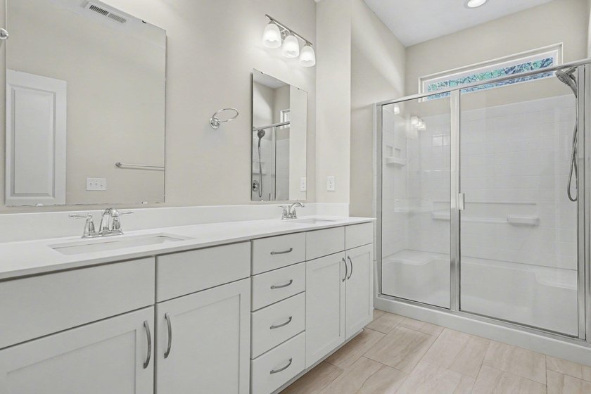 This well-designed three-bedroom, two-bathroom home features an - photo 17