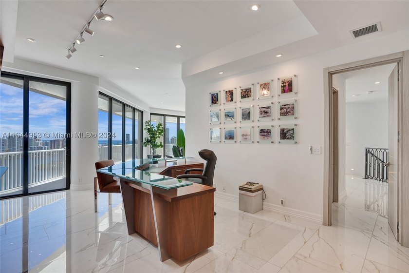 SPECTACULAR, FULLY REMODELED 2 STORY PENTHOUSE HOME OVERLOOKING - photo 17