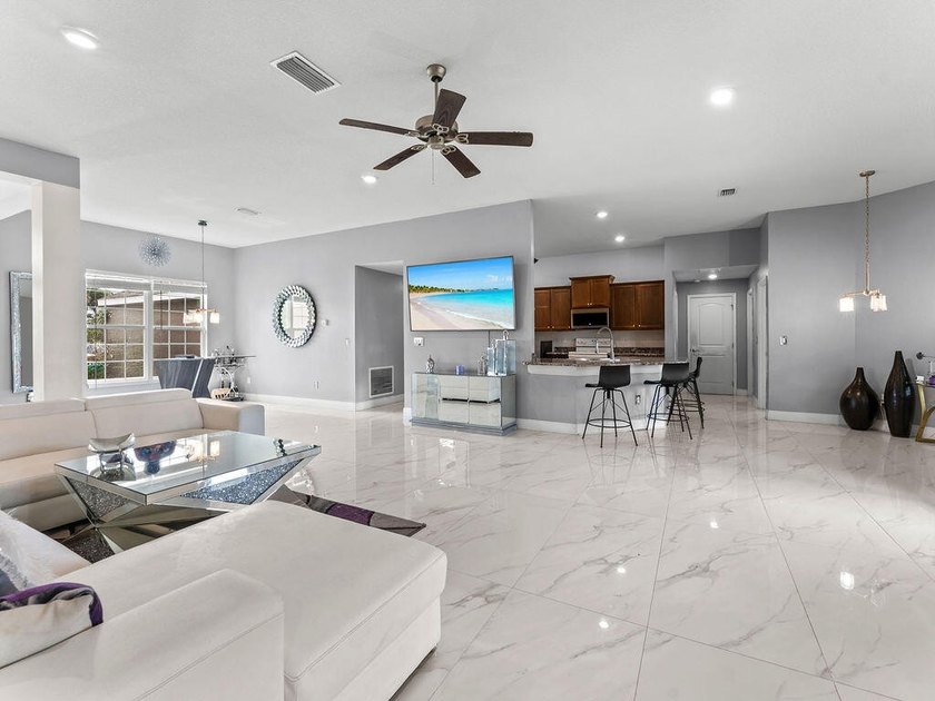Welcome to this stunning and meticulously maintained 4-bedrm + - photo 17