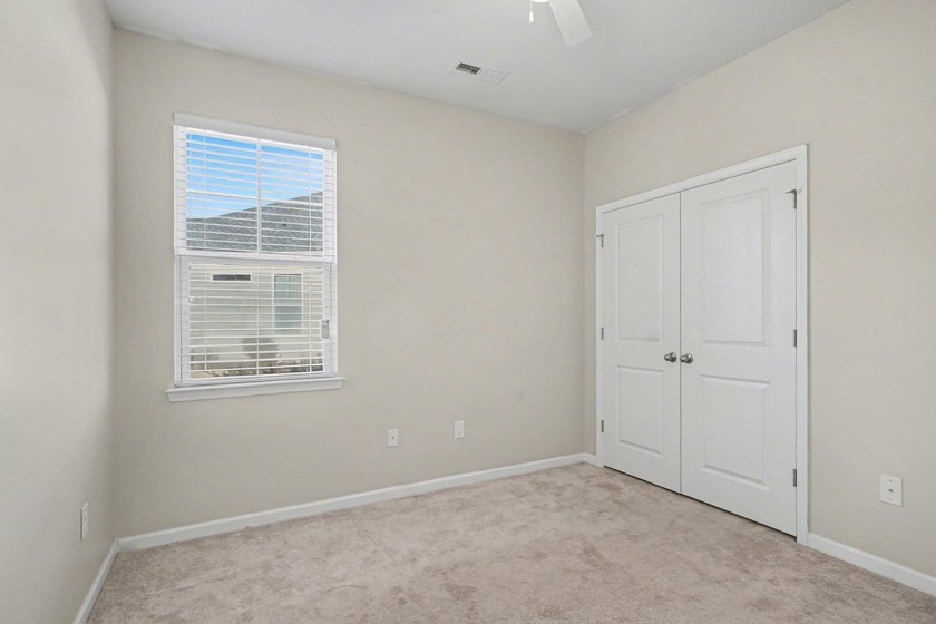 This well-designed three-bedroom, two-bathroom home features an - photo 19