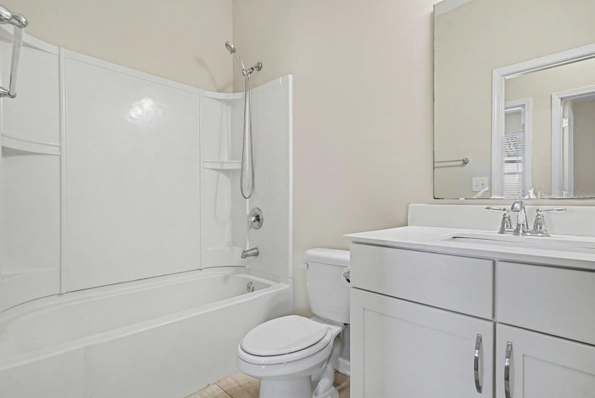 This well-designed three-bedroom, two-bathroom home features an - photo 21