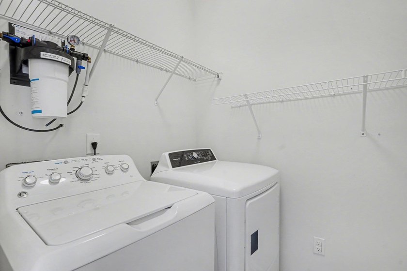 This well-designed three-bedroom, two-bathroom home features an - photo 25