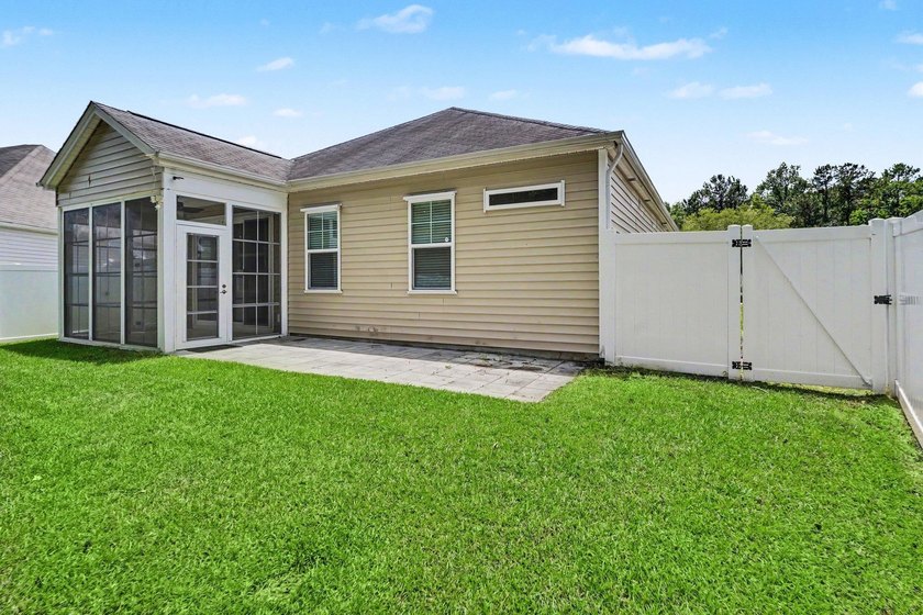 This well-designed three-bedroom, two-bathroom home features an - photo 32