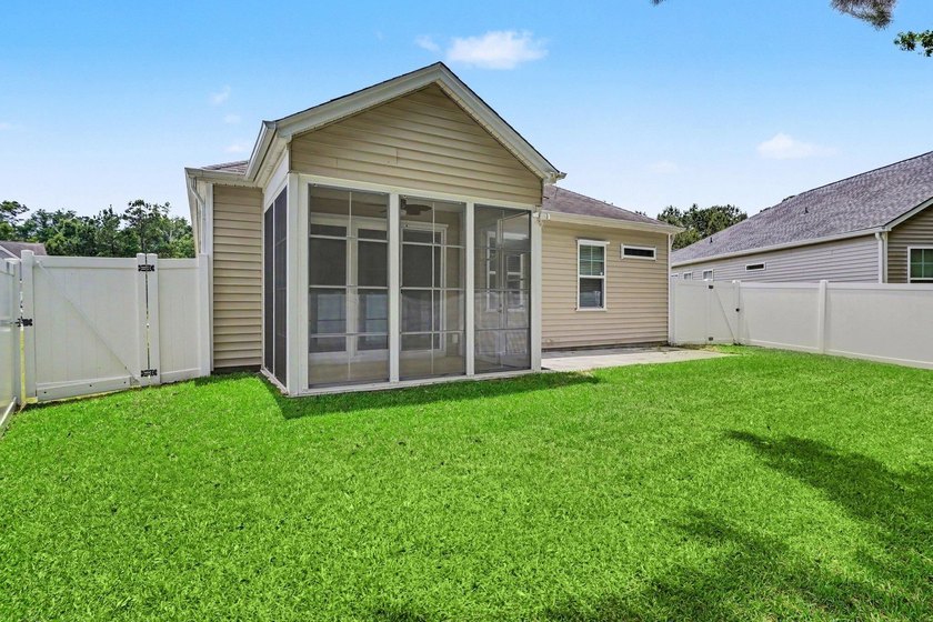 This well-designed three-bedroom, two-bathroom home features an - photo 33
