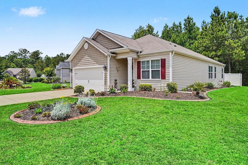 This well-designed three-bedroom, two-bathroom home features an - photo 36
