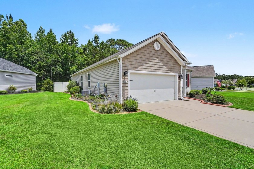This well-designed three-bedroom, two-bathroom home features an - photo 37