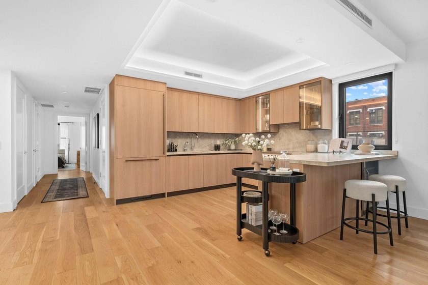 Light, warmth, and design intention converge in this Park Slope - photo 2