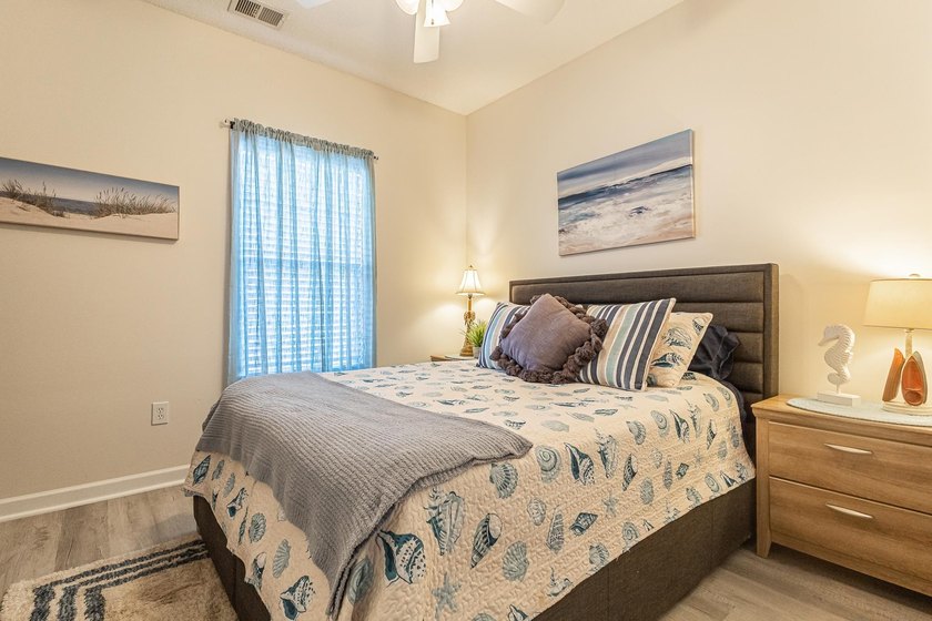 This well-maintained 2-bedroom, 2-bath condo offers a - photo 12