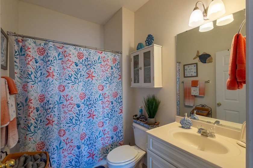 This well-maintained 2-bedroom, 2-bath condo offers a - photo 17