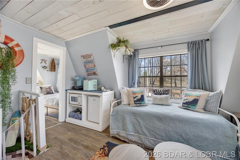 Freshly remodeled, this charming A-frame instantly feels like a - photo 24