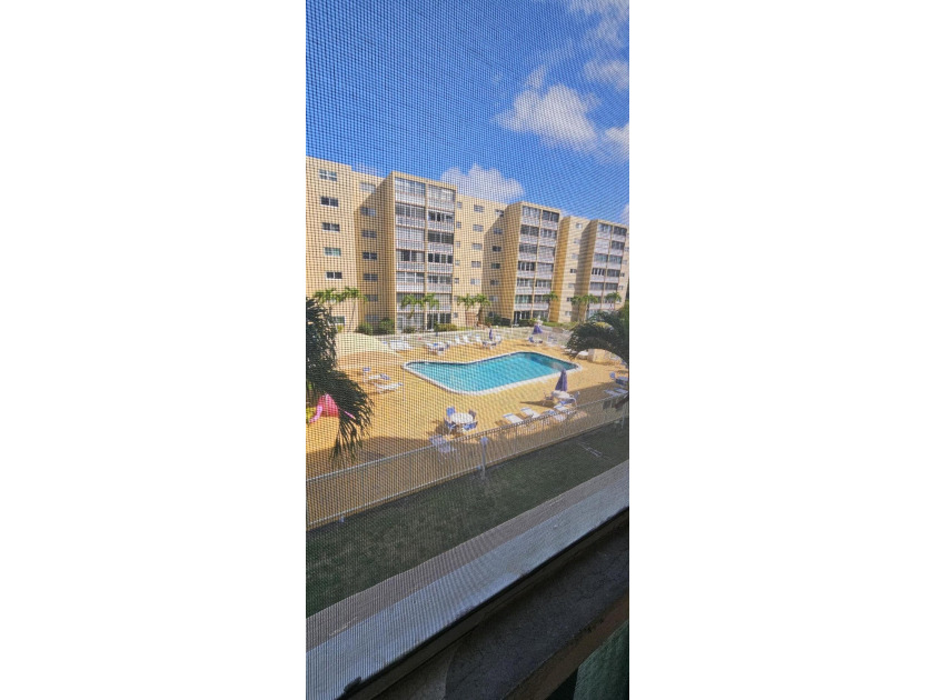 55+ Community .Wonderful View of Pool Area. Lg 2/2 remodeled - photo 2