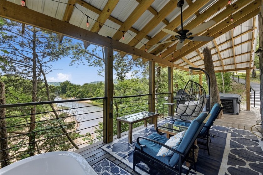 Secluded on 32.36 acres along the Kings River, this - photo 4