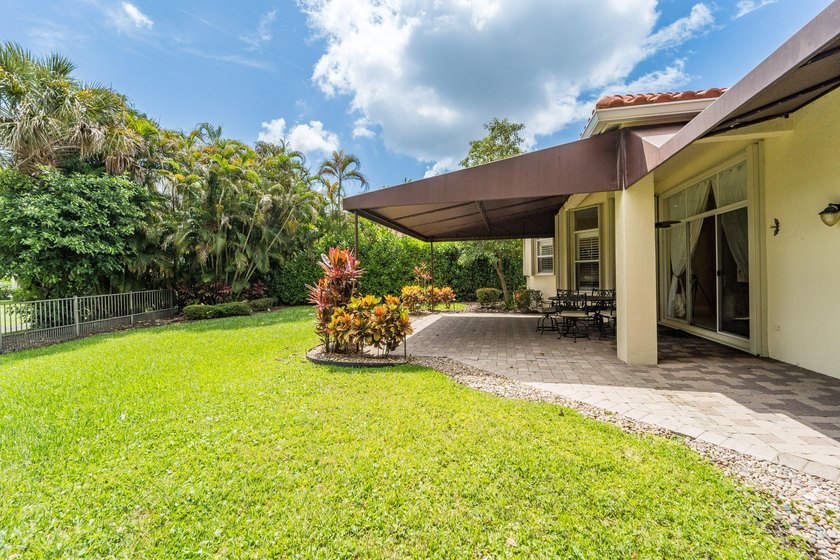 Welcome to this single-story waterfront residence in the - photo 32