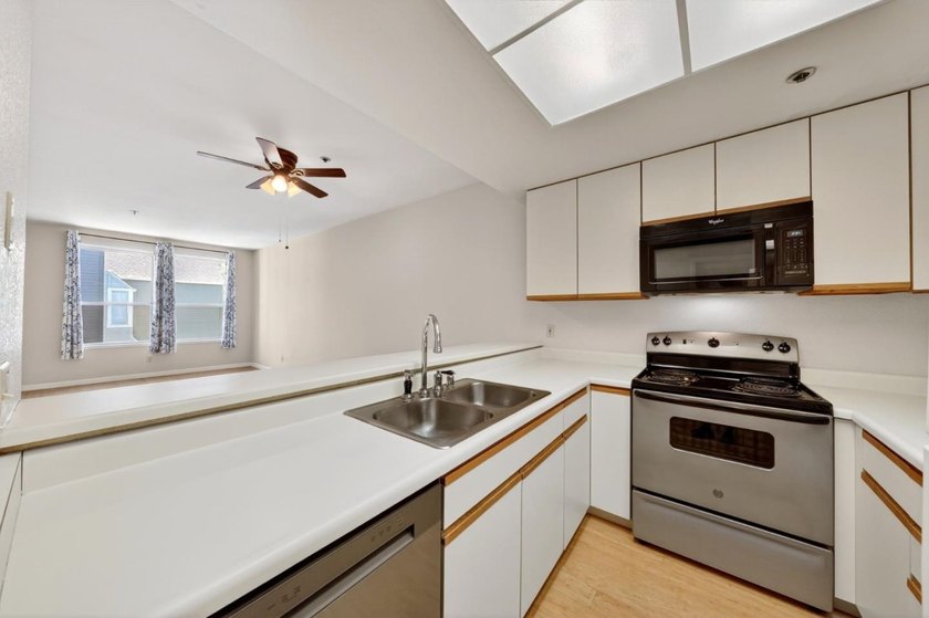 Welcome to 411 Park Ave, a desirable top-floor corner unit in a - photo 10