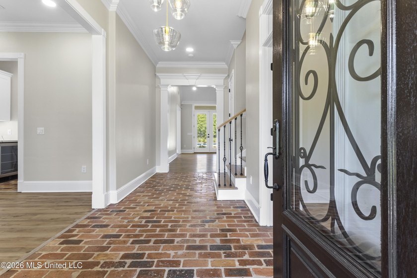 Tucked behind a gated entrance on 5 private acres, this - photo 10