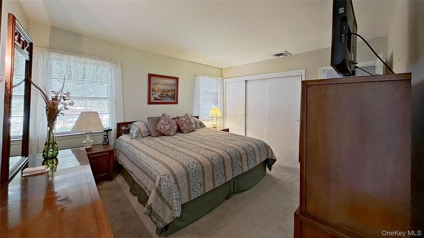 A GREAT BUY situated on a large, private lot, convenient to all! - photo 14