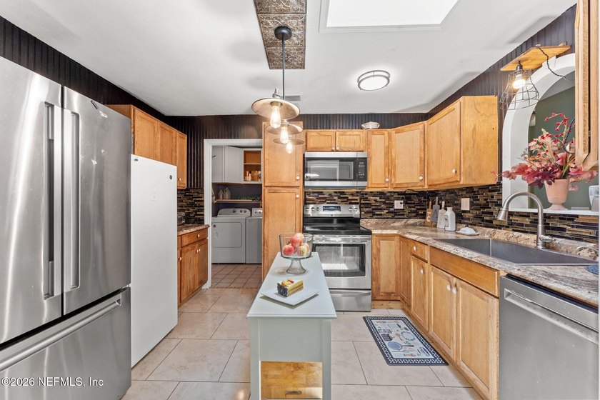Welcome to 178 Segovia Road, a 3-bedroom, 2-bath pool home with - photo 10