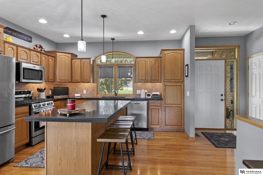Enjoy sweeping golf course views from this ideally located brick - photo 12